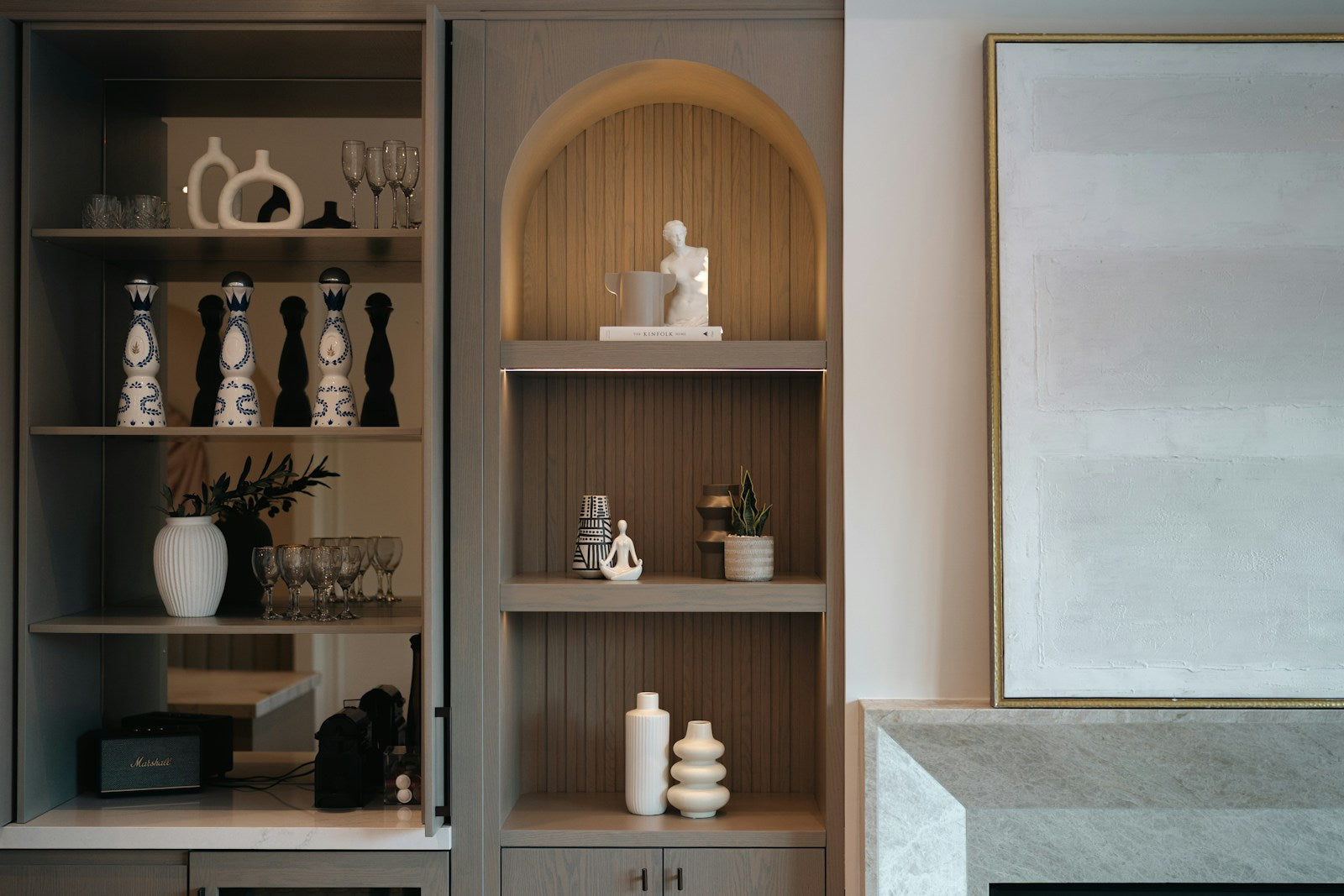 Home shelving with ceramics and decorative objects