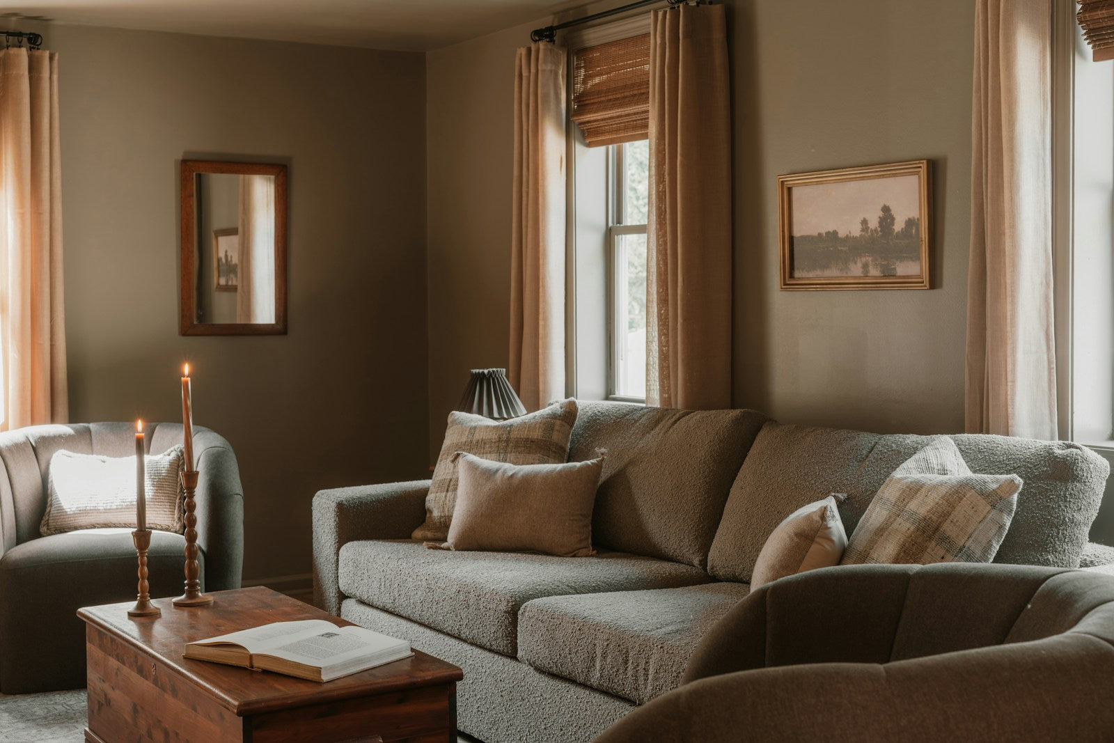 Warm living room with a coffee table, sofa and cushions